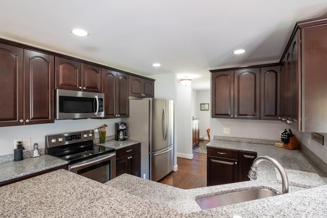 inside-of-kitchen-with-dark-wood-cabinet
