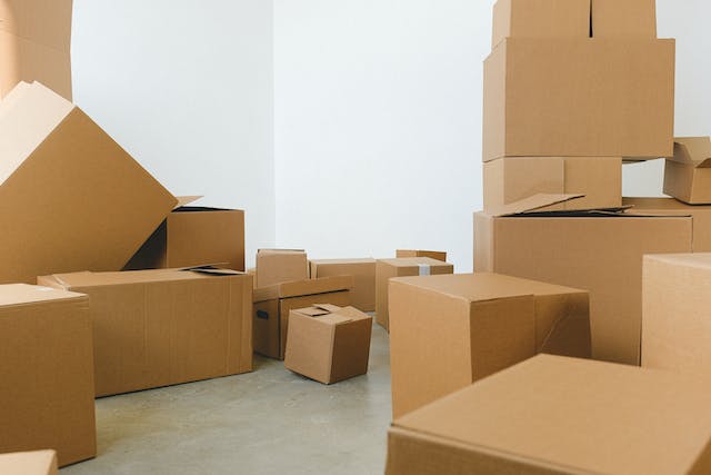 moving-cardboard-boxes-on-floor